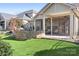 Landscaped backyard with patio and fire pit at 136 Chimney Rock Ct, Denver, NC 28037