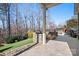 Landscaped backyard with fire pit and seating at 136 Chimney Rock Ct, Denver, NC 28037