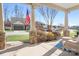 Peaceful front porch with seating area overlooking the neighborhood at 136 Chimney Rock Ct, Denver, NC 28037