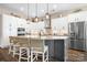 Modern kitchen with stainless steel appliances and ample counter space at 136 Chimney Rock Ct, Denver, NC 28037