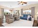 Relaxing living room with comfortable seating and hardwood floors at 136 Chimney Rock Ct, Denver, NC 28037