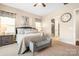 Bright main bedroom featuring a comfortable sitting area and ensuite bathroom access at 136 Chimney Rock Ct, Denver, NC 28037