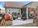 Large patio with outdoor kitchen and seating at 136 Chimney Rock Ct, Denver, NC 28037