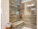 Spa-like shower with glass enclosure and built-in seat at 136 Chimney Rock Ct, Denver, NC 28037