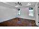 Bright bedroom with hardwood floors and ceiling fan at 3907 E Lawyers Rd, Monroe, NC 28110