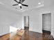 Spacious bedroom with hardwood floors and built-in shelving at 3907 E Lawyers Rd, Monroe, NC 28110