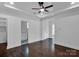 Main bedroom with hardwood floors and ensuite bathroom at 3907 E Lawyers Rd, Monroe, NC 28110