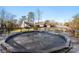 Backyard with a large pool, a deck and mature trees at 946 Scotch Dr, Gastonia, NC 28054