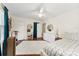 Bright bedroom featuring a ceiling fan, hardwood floors, white furniture, and blue drapes at 946 Scotch Dr, Gastonia, NC 28054