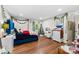 Bedroom featuring hardwood floors, blue headboard bed, white dresser and holiday decor at 946 Scotch Dr, Gastonia, NC 28054