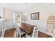 Formal dining room with hardwood floors, elegant chandelier, and comfortable seating at 946 Scotch Dr, Gastonia, NC 28054