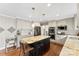 Well-equipped kitchen featuring granite countertops, stainless steel appliances, and custom cabinetry at 946 Scotch Dr, Gastonia, NC 28054