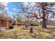 Brick house with backyard, grill, trees, and storage shed at 955 Goodnight Rd, Salisbury, NC 28147