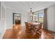 Charming dining room with hardwood floors, a wooden table, and view to living room at 955 Goodnight Rd, Salisbury, NC 28147