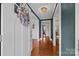 Inviting entryway with hardwood floors and a view to the living room at 955 Goodnight Rd, Salisbury, NC 28147