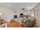 Spacious living room featuring hardwood floors, a fireplace, and ample natural light at 955 Goodnight Rd, Salisbury, NC 28147