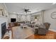 Living Room with hardwood floors, sectional sofa, and a cozy fireplace at 955 Goodnight Rd, Salisbury, NC 28147