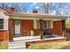 Front porch with rocking chairs and farmhouse decor at 955 Goodnight Rd, Salisbury, NC 28147