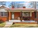 Front porch with rocking chairs and farmhouse decor at 955 Goodnight Rd, Salisbury, NC 28147