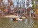 Aerial shot of private waterfront with dock and boat lift, a boater's dream at 1140 Inlet Pointe Rd, Salisbury, NC 28146