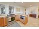Well-lit kitchen with stainless steel appliances and granite countertops at 1140 Inlet Pointe Rd, Salisbury, NC 28146