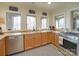 Well-lit kitchen with stainless steel appliances and granite countertops at 1140 Inlet Pointe Rd, Salisbury, NC 28146