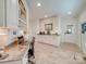 Bright kitchenette featuring a desk and plenty of cabinet space with nice flooring at 1140 Inlet Pointe Rd, Salisbury, NC 28146