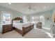Serene primary bedroom with ample natural light, neutral decor, and a relaxing atmosphere at 1140 Inlet Pointe Rd, Salisbury, NC 28146