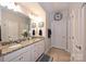 Double vanity bathroom with granite countertops and updated fixtures at 2353 Abundance Ln, Waxhaw, NC 28173