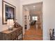 Bright and spacious entryway with hardwood floors and decorative console table at 2353 Abundance Ln, Waxhaw, NC 28173