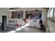 Organized garage with storage system and work bench at 2353 Abundance Ln, Waxhaw, NC 28173
