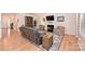Spacious living room with hardwood floors, fireplace, and comfortable seating at 2353 Abundance Ln, Waxhaw, NC 28173