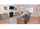 Living room with hardwood floors, fireplace, and comfortable seating at 2353 Abundance Ln, Waxhaw, NC 28173
