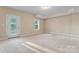Spacious basement with exterior access and window at 310 Pine St, Locust, NC 28097