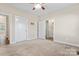 Bedroom with two closets and access to bathroom at 310 Pine St, Locust, NC 28097