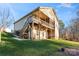Two-story house with large deck and lake view at 310 Pine St, Locust, NC 28097