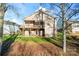 House exterior showcasing a deck and lake view at 310 Pine St, Locust, NC 28097