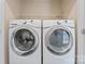 Convenient laundry room with washer and dryer included at 310 Pine St, Locust, NC 28097
