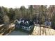 Aerial view of a two-story house with a pond nearby at 357 Triple Ponds Ct, Clover, SC 29710