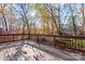 Spacious deck with wood railings, surrounded by trees with fall foliage at 1065 Gauguin Ln, Fort Mill, SC 29708