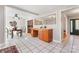 Open concept with a dining area featuring tile floors and a view into the breakfast bar and kitchen at 1065 Gauguin Ln, Fort Mill, SC 29708