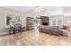 Spacious living room with tile flooring, a stone fireplace, and bright natural light at 1065 Gauguin Ln, Fort Mill, SC 29708