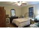 Traditional bedroom featuring a decorative quilt, wood floors, and comfortable furnishings at 155 6Th Sw St, Taylorsville, NC 28681