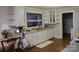 Bright kitchen with ample counter space, white cabinetry, and hardwood flooring at 155 6Th Sw St, Taylorsville, NC 28681