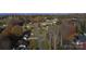 Aerial view showcasing a well-kept neighborhood and tree-lined street at 194 E Jay Dr # 3, Taylorsville, NC 28681