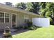 This cozy home has a lovely backyard and patio area with a white privacy fence at 194 E Jay Dr # 3, Taylorsville, NC 28681