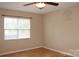 Bedroom with natural light from a window, decorative wall art and wood floors at 194 E Jay Dr # 3, Taylorsville, NC 28681