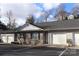Charming condo featuring a stone facade, attached garage, and well-maintained landscaping at 194 E Jay Dr # 3, Taylorsville, NC 28681