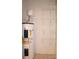 A well-maintained utility closet featuring a water heater and white wire shelving at 194 E Jay Dr # 3, Taylorsville, NC 28681