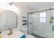 Well-lit bathroom with walk-in shower and sleek vanity at 405 Wakefield Dr # B, Charlotte, NC 28209